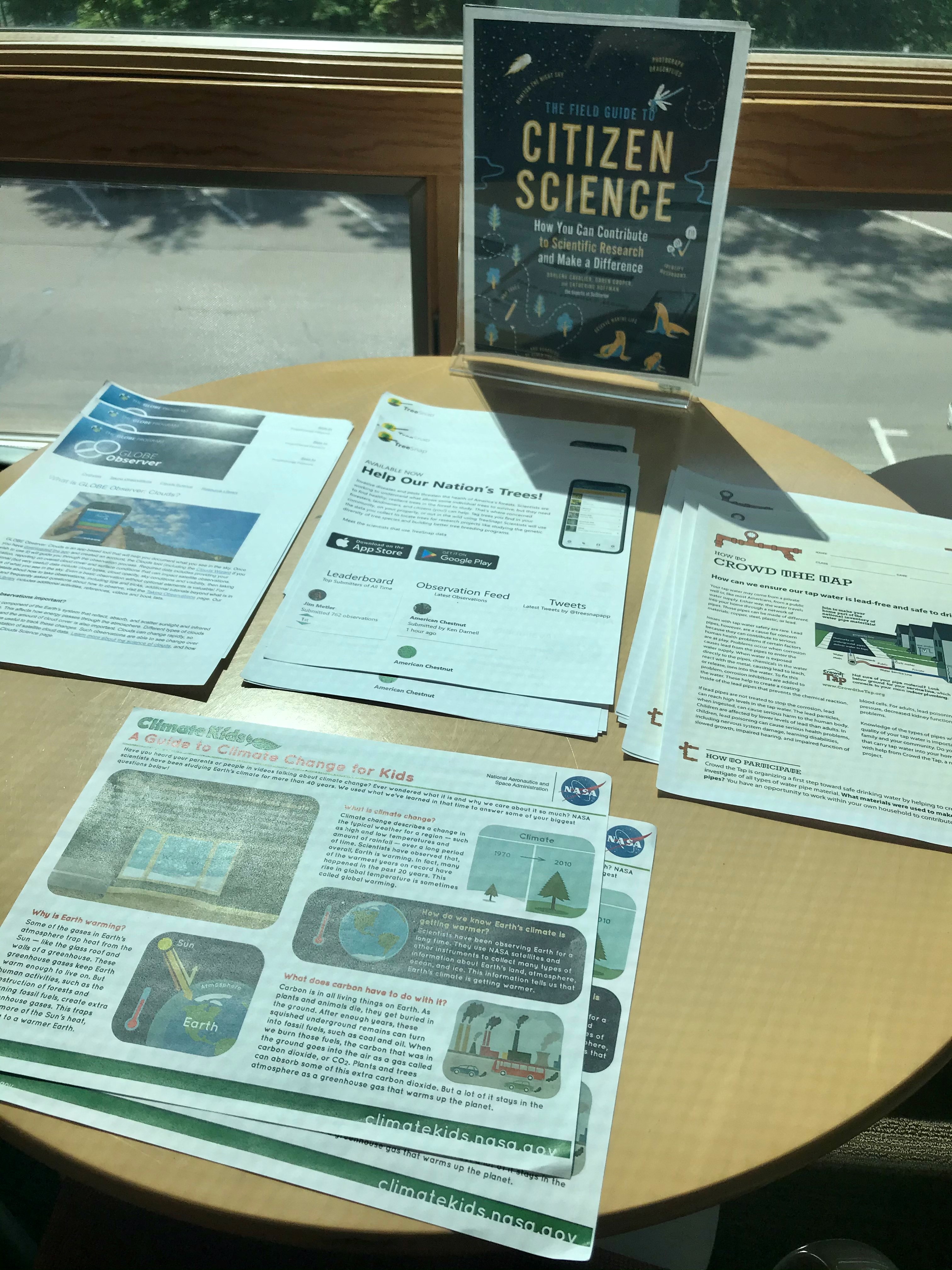 A tabletop display with Citizen Science flyers