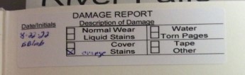 Damage report label with options for indicating damage
